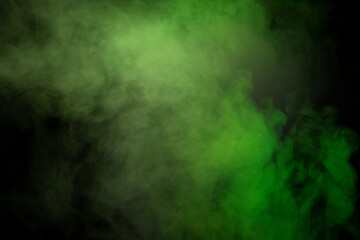 Green and white steam on a black background.