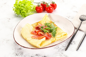 Russian pancake with salmon fish