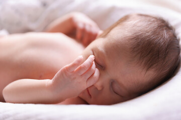 Bedtime. Cute little baby sleeping in lounger indoors