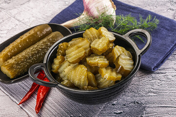Sliced marinated cucumbers in the bowl