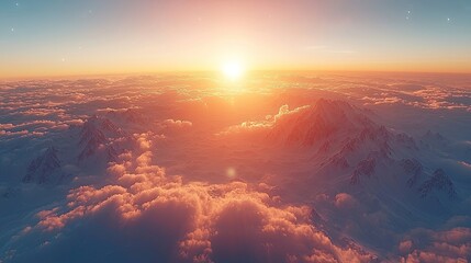 Aerial View of Snowcapped Mountains at Sunset Over a Sea of Clouds