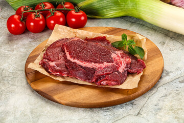 Raw beef cheeks cut for cooking