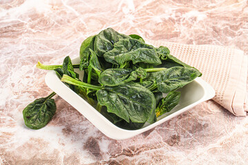 Fresh green spinach leaves heap