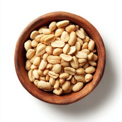 Roasted peanuts in bowl, overhead on white background