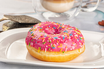 Sweet donut with strawberry icing