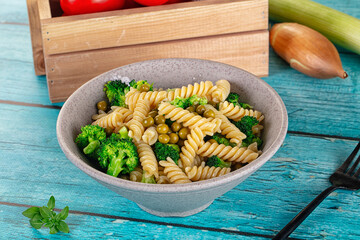 Italian vegan pasta fusilli with broccoli