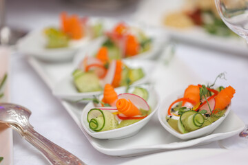 Elegant vegetable slices served on a banquet table