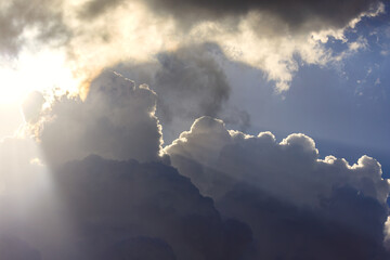 A Dramatic Sky Featuring Radiant Sunlight and Beautiful Clouds in a Peaceful Atmosphere