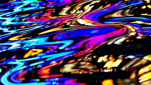 Vibrant liquid light patterns in motion: psychedelic waves and colorful reflections