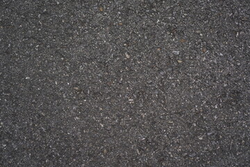 Textured background of old asphalt surface