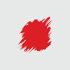 Brush patch and paint splash with a dynamic, irregular shape and rough edges on a gray  background, featuring scattered splatters for a vibrant and artistic effect