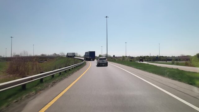 Car traffic driving on multiple lanes highway and interstate 315 and 270 belt outside Columbus, Ohio in midwest American roadway turnpike near northern city traffic by Worthington, OH