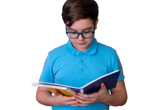 Young caucasian male child reading notebooks wearing glasses and blue polo shirt