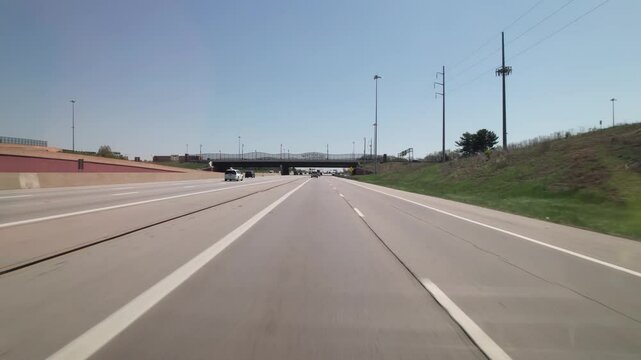 Car traffic driving on multiple lanes highway and interstate 315 and 270 belt outside Columbus, Ohio in midwest American roadway turnpike near northern city traffic by Worthington, OH