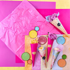 Color palette mood board in bright crimson and yellow tones for interior design and decor, top view