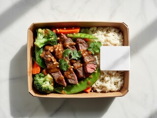 Delicious beef stir-fry with rice and vegetables featuring fresh broccoli, snap peas, and carrots in a takeout container