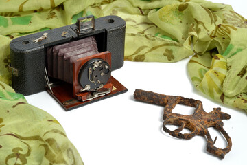 Antique Bellows Camera and Replica Firearm Still Life