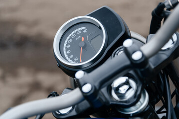 speedometer instruments on front panel of motorcycle