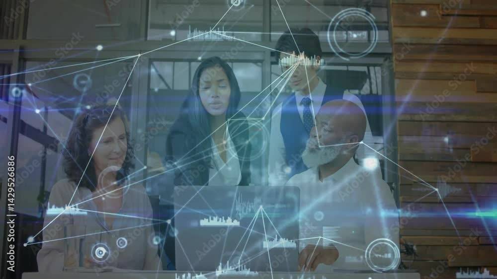 Poster technology team collaborating around laptop in office showing floating data nodes moving bar charts