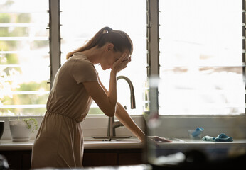 Crying woman at home having a mental breakdown 