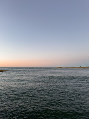  Peaceful Coastal Waters at Sunset with Gradient Sky