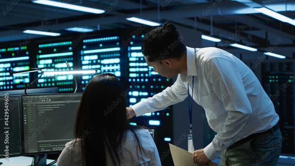 Poster computer scientists in data center managing and maintaining databases, ensuring data integrity and s