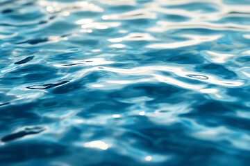 Fototapeta premium light blue water texture, with light ripples, blurred.