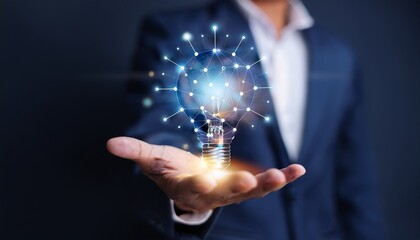 A man in a suit holding a light bulb shaped like a network in his hand against a dark background