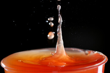 Splashes of apple cider vinegar. The apple juice is then fermented by yeast which converts the sugars in the juice to ethanol