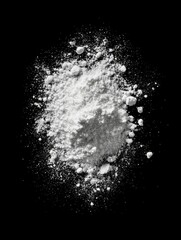 White Powder Explosion on Black Background