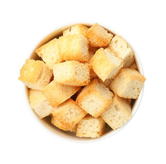 Delicious crispy croutons in bowl isolated on white, top view