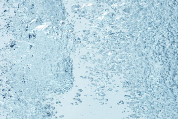 Soda water with bubbles as background, closeup