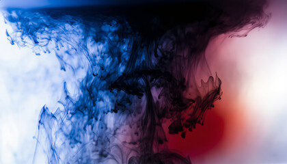 Abstract experimental photography, close-up shot of swirling ink in water