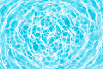 Blue water with ripples on the surface. Defocus blurred transparent blue colored clear calm water surface texture with splashes and bubbles. Water waves with shining pattern texture background.