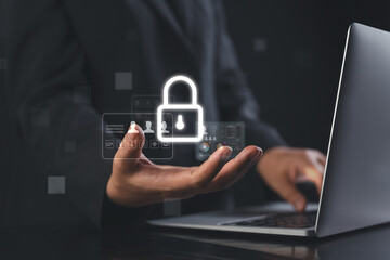 businessman's hand interacting with futuristic virtual interface showing personal data protection and corporate security icons to depict privacy and data breach prevention in modern workplaces