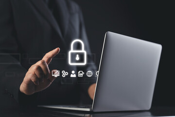 close-up of a businessman's hand using holographic digital screen to access sensitive data icons including secure login and password protection in a high tech office environment
