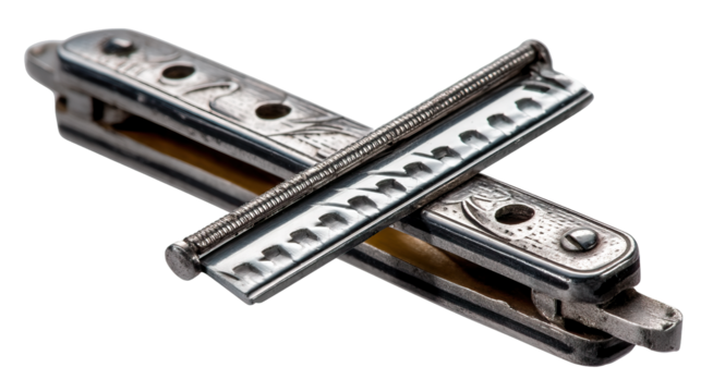 Close-up of a razor blade, electric guitar, and harmonica isolated on a white background, highlighting sharp tools and musical instruments