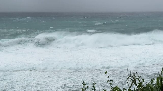 Large Storm Waves Crash Ashore On Rugged Tropical Island - Khanun