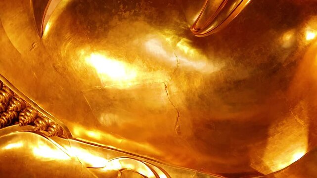 Golden Face and Patterns of Reclining Statue