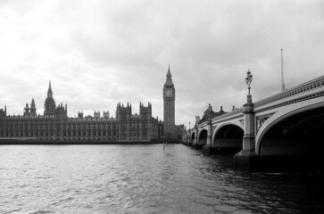 Vintage grainy analog view of westminster bridge and big ben in london