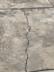 Fototapeta premium broken cement road texture