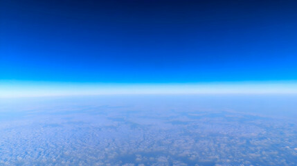 Aerial view showcasing Earth's horizon, highlighting atmospheric gradients and cloud formations