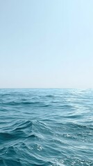 Obraz premium Turquoise Sea Waves with Horizon Under Clear Blue Sky for Nature Background