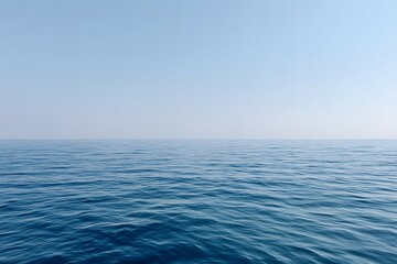 Fototapeta premium Seascape View Of Blue Ocean Water With Small Waves Under Clear Sky Outdoors