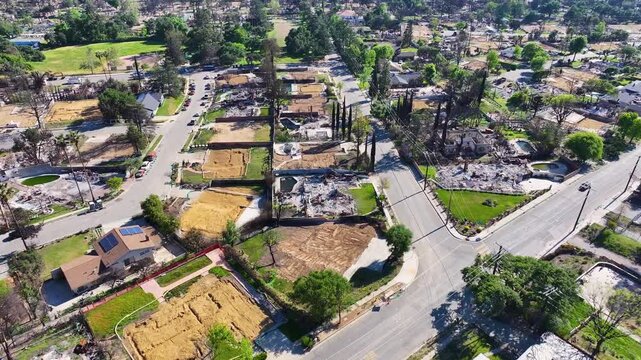 Aerial footage of homes destroyed in the wildfires in Altadena California USA