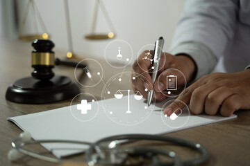 medicine law A doctor and a lawyer discussed health care, justice, and ethics in a clinic,...