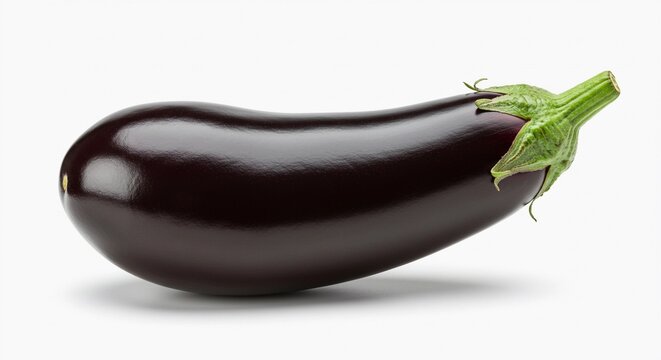 Close up studio shot of a single ripe eggplant with a green stem on a plain white background