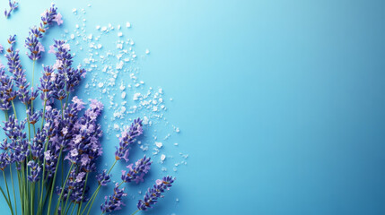 Obraz na płótnie Canvas Natural skin care concept with lavender flowers and sea salt on a blue background