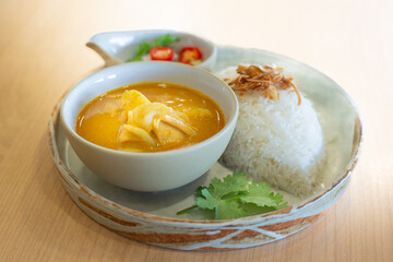 Massaman Curry is popular Thai food. Chicken curry with coconut milk, chili, and spicy herbs.