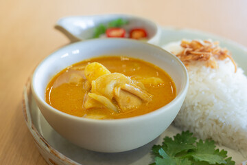 Massaman Curry is popular Thai food. Chicken curry with coconut milk, chili, and spicy herbs.
